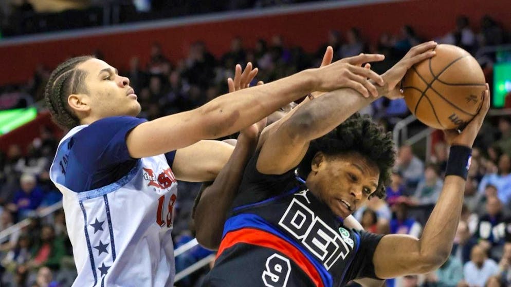 Kyshawn George (left) gets revenge with the Wizards against the Pistons