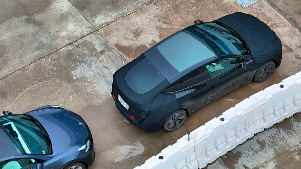 Tesla owners camouflage their cars. A parked Model Y in Texas is transformed into a new brand with cloths.