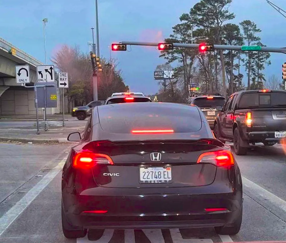 Tesla owners camouflage their cars. This Tesla comes as a Honda Cvic.