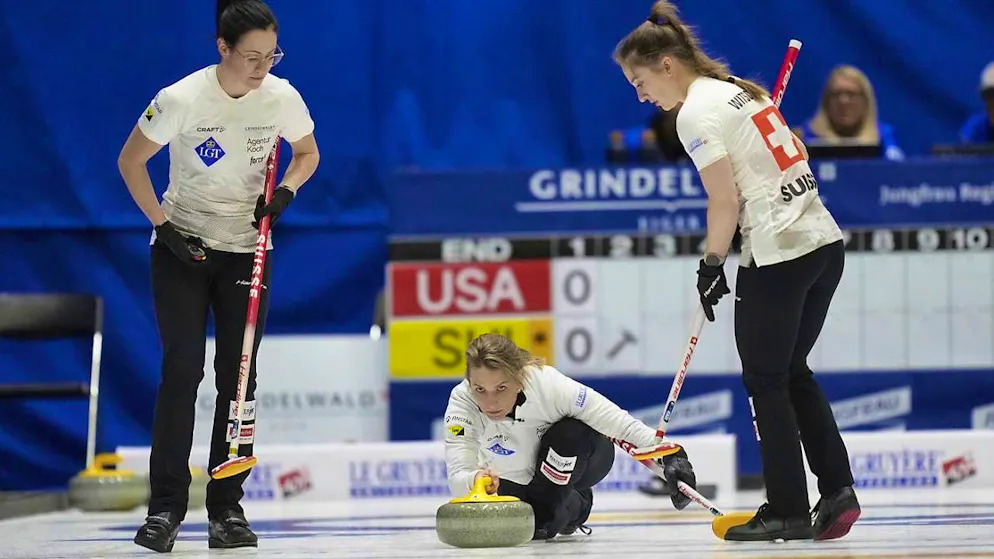 Skip Silvana Tirinzoni during a stone delivery in the World Championship opener against the USA