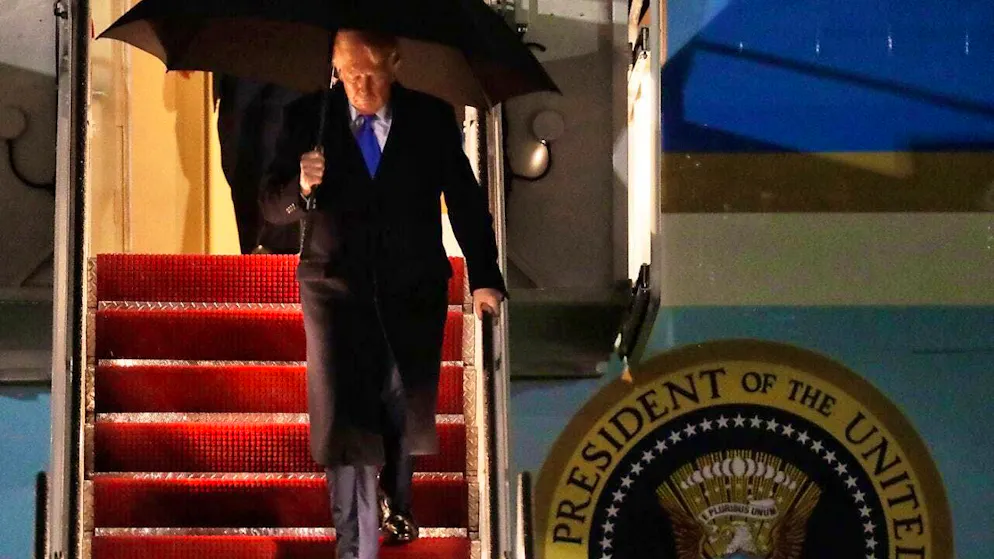 President Donald Trump walks down the stairs of Air Force One upon his arrival at Joint Base Andrewsm. Photo: Luis M. Alvarez/AP/dpa