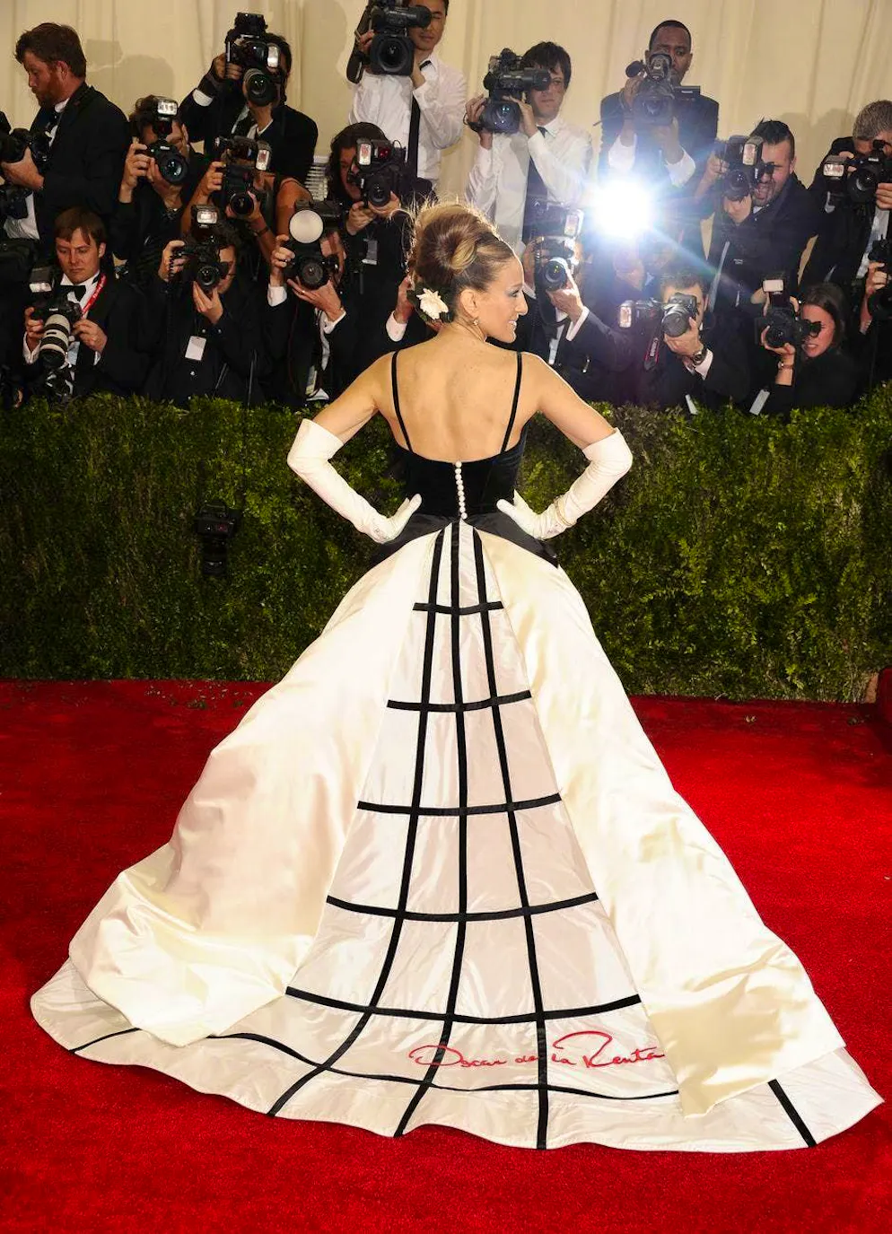 Sarah Jessica Parker - a look at her unforgettable looks. In 2014, you could also count on the "Sex & The City" star to take it to the extreme. The gala was dedicated to Charles James, the pioneering designer of the 20th century, and the dress by Oscar de la Renta was a nod to James' famous silhouette: tight-fitting corsets and swinging skirts.