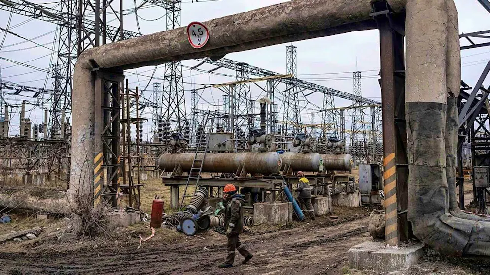 ARCHIVE - Workers at a power plant are trying to repair damage that Ukraine claims was caused by a Russian attack. The EU is providing financial aid to Ukraine with proceeds from frozen Russian state assets. Now there is a new disbursement. Photo: Evgeniy Maloletka/AP/dpa
