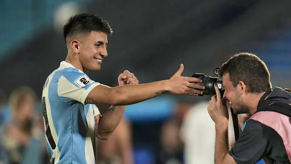 Thiago Almada poses for the photographer after scoring the winning goal.