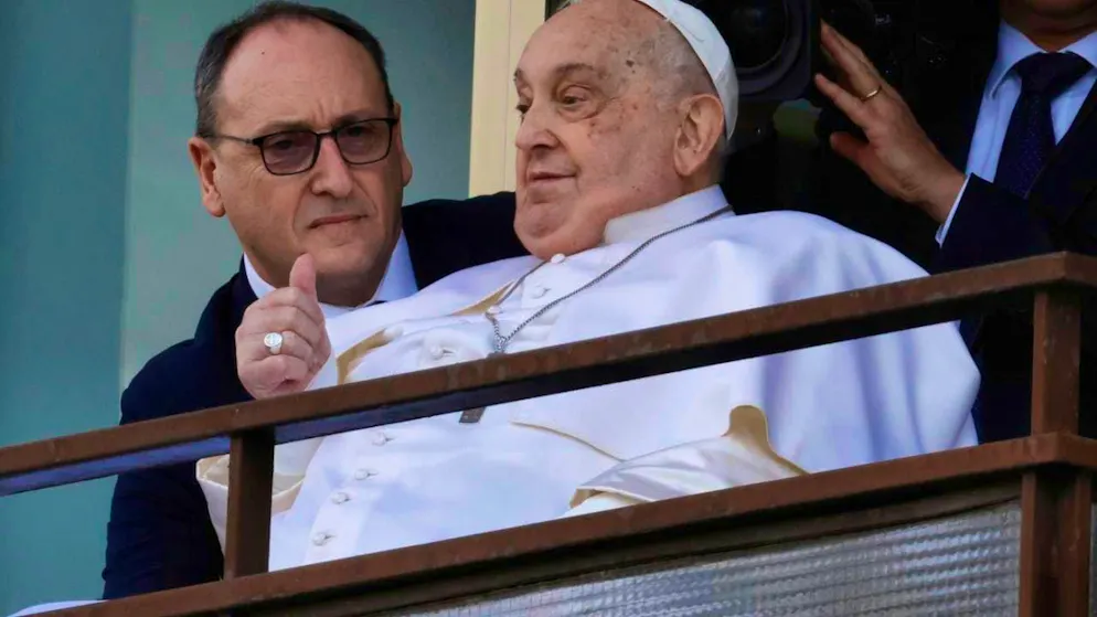 Pope Francis gives a thumbs-up at a window of the Agostino Gemelli Polyclinic in Rome, where he has been undergoing treatment for bronchitis and bilateral pneumonia since February 14. He is due to leave the clinic later and return to his residence in the Vatican. Photo: Riccardo De Luca/AP/dpa