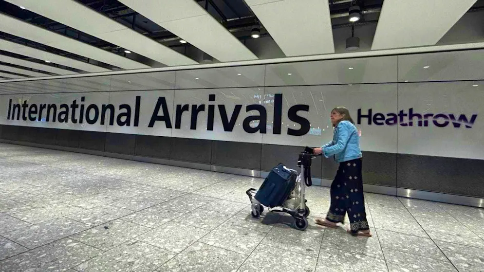A traveler arrives at Terminal 5 at Heathrow Airport, which is slowly resuming flight operations after a fire. Photo: Kirsty Wigglesworth/AP/dpa