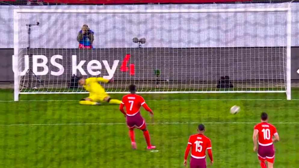 Breel Embolo confidently converts the penalty.