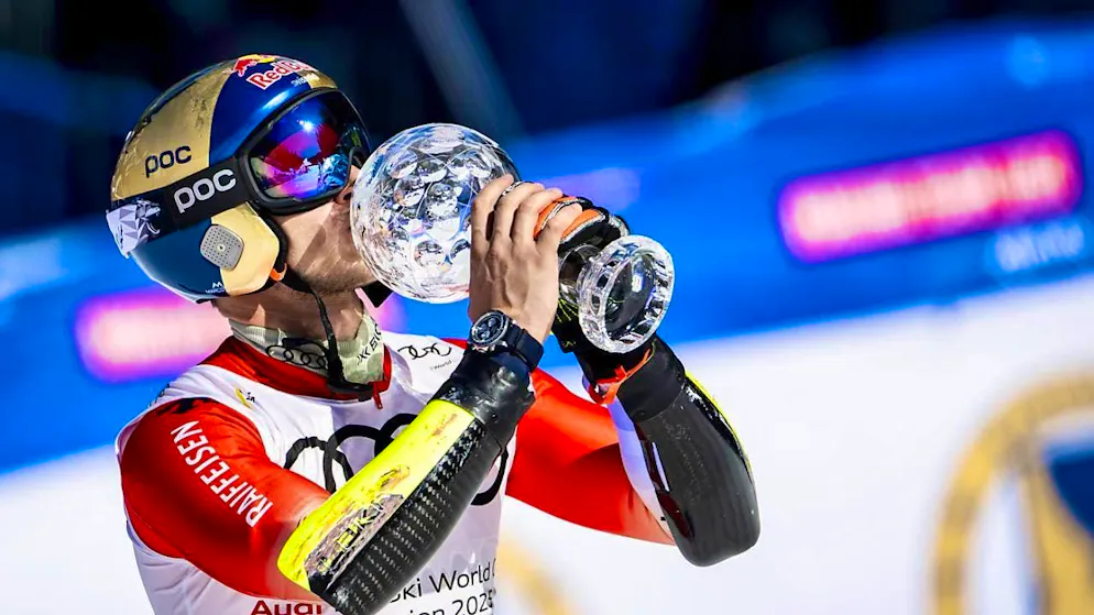 Marco Odermatt with his giant slalom ball