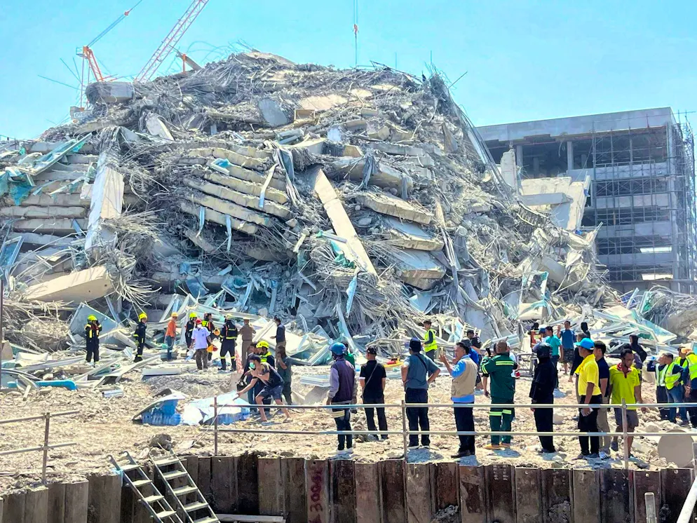 At least 43 people are trapped under the rubble of the high-rise building. 