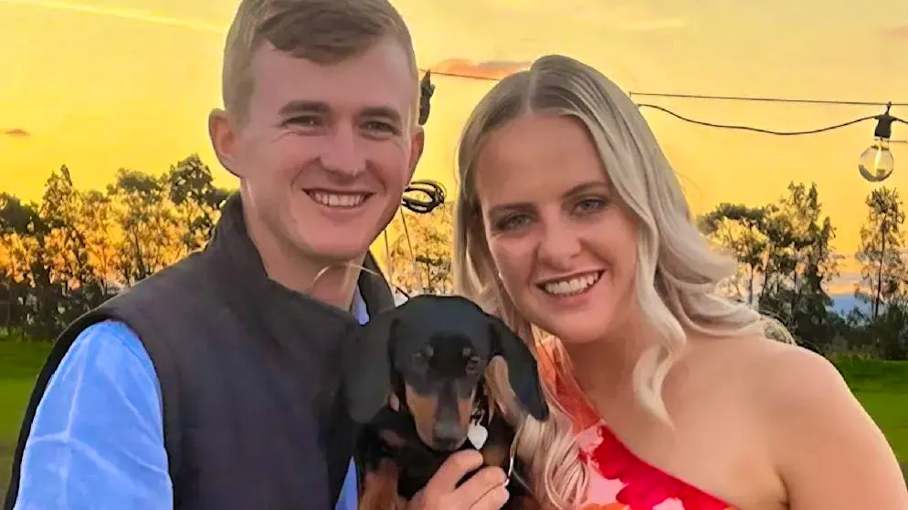 Josh Fishlock and Georgia Gardner with dwarf dachshund Valerie before his disappearance.