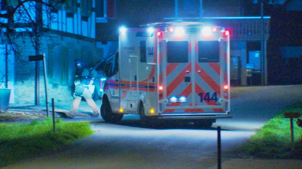 An ambulance arrived shortly before midnight. 