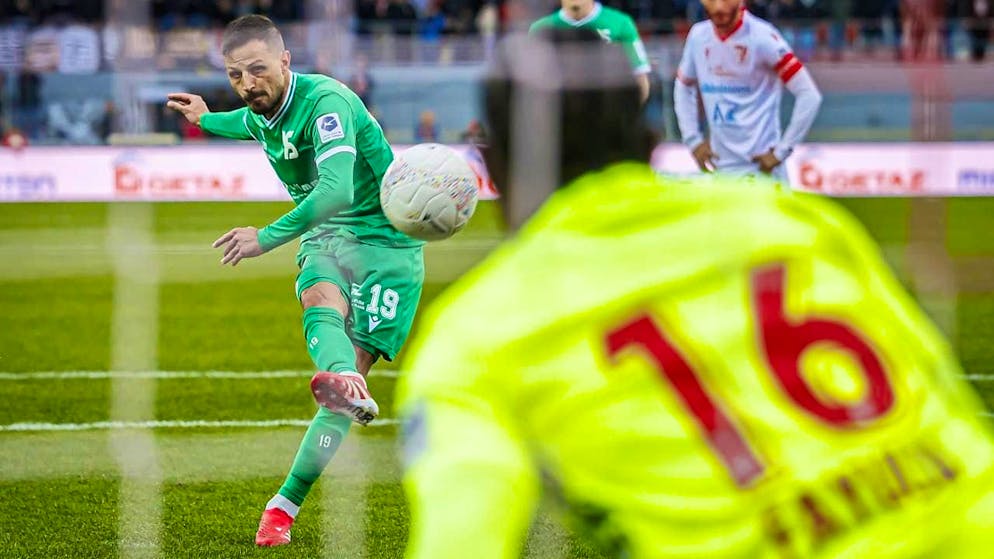 Yverdon's Antonio Marchesano shoots over the goal during the penalty against Sion