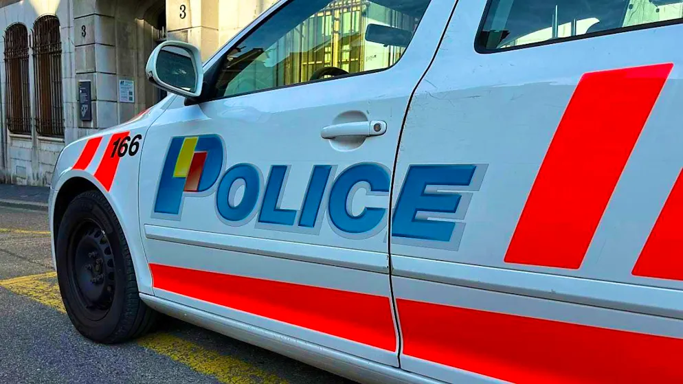 ARCHIVE - The word "Police" is written on a police car in French-speaking Switzerland. Photo: Christiane Oelrich/dpa