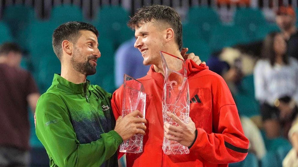 Novak Djokovic (left) congratulates Jakob Mensik on his title in Miami.