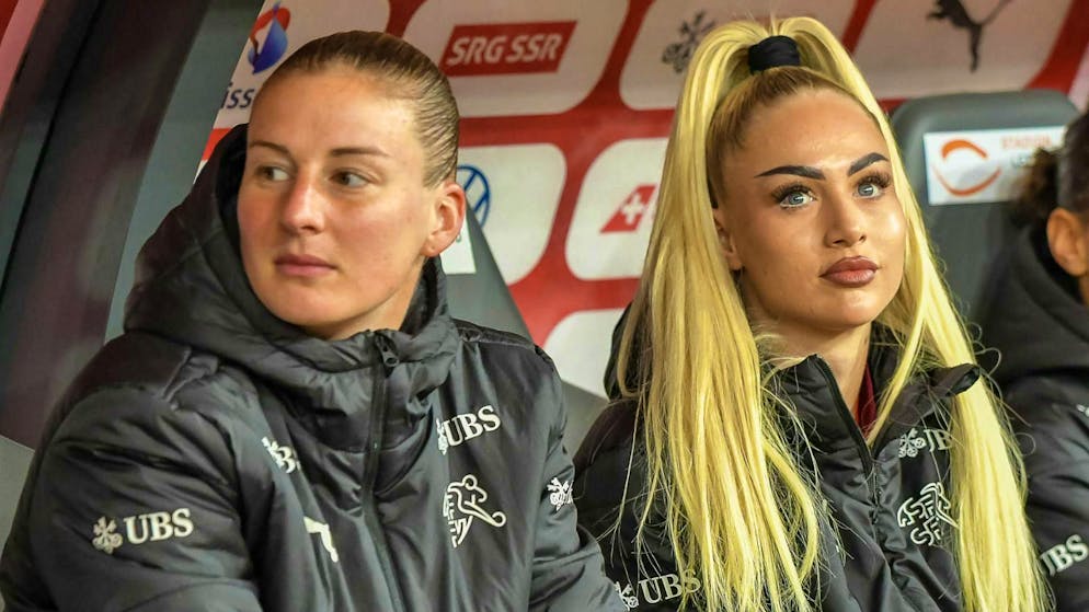 They live in different worlds: Here Julia Stierli (left) sits next to Alisha Lehmann, the social media queen of women's football.