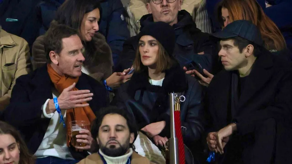 Celebrities in the provinces just over the Swiss border: actors Michael Fassbender (left) and Keira Knightley at Como's Serie A match against AS Roma