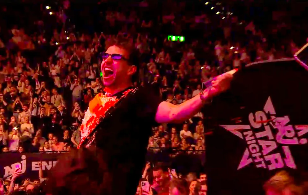 Here, a spectator was pelted with cake.