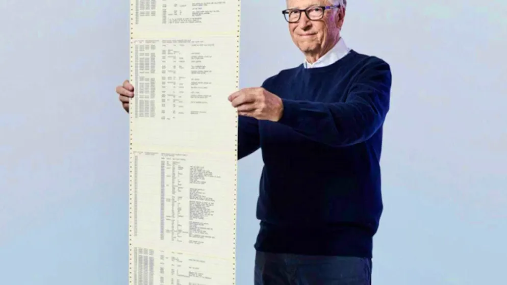 Microsoft founder Bill Gates with a printout of the computer code that launched the software company in April 1975. (archive image)
