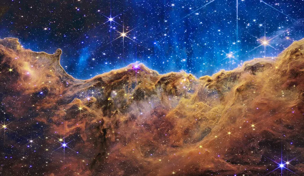 This is what the edge of an area where stars are being born looks like.