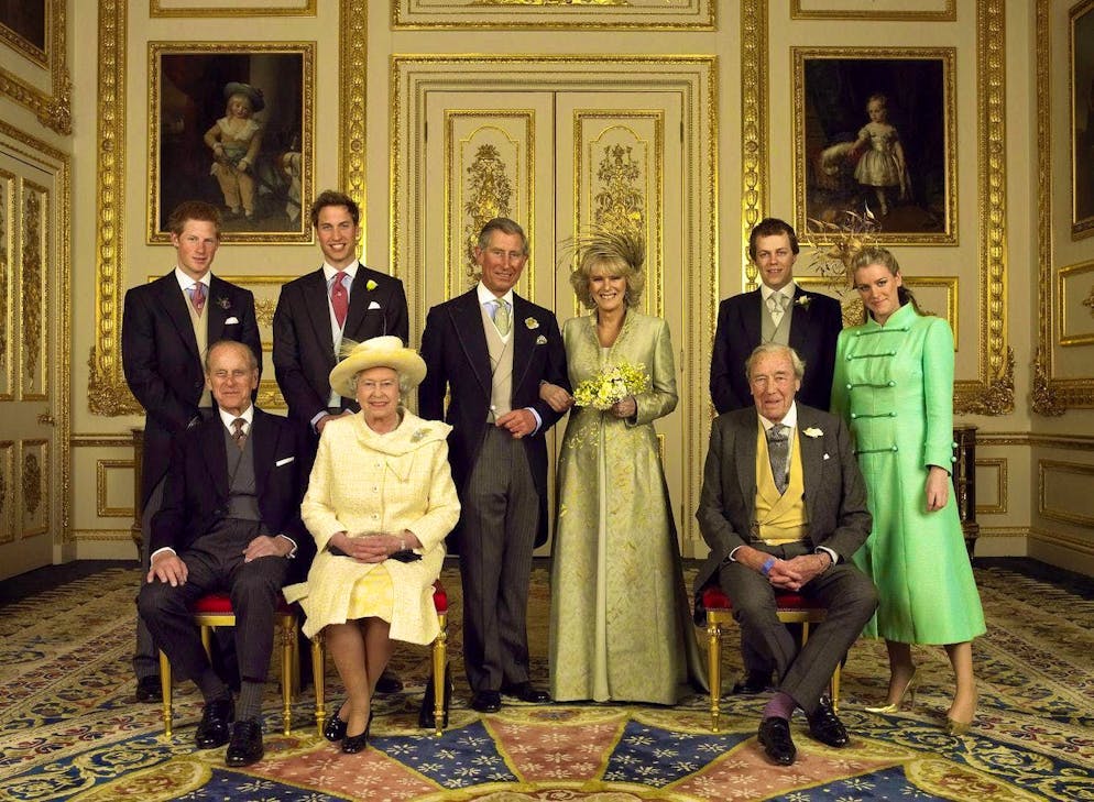 King Charles and Camilla: 20th wedding anniversary. Wedding photo from Clarence House on April 10, 2005: The Prince of Wales Charles with his bride Camilla and their family: Prince Harry, Prince William, Camilla's children Tom and Laura Parker Bowles (from left to right). In the front row: Queen Elizabeth II with her husband and Camilla's father Major Bruce Shand.
