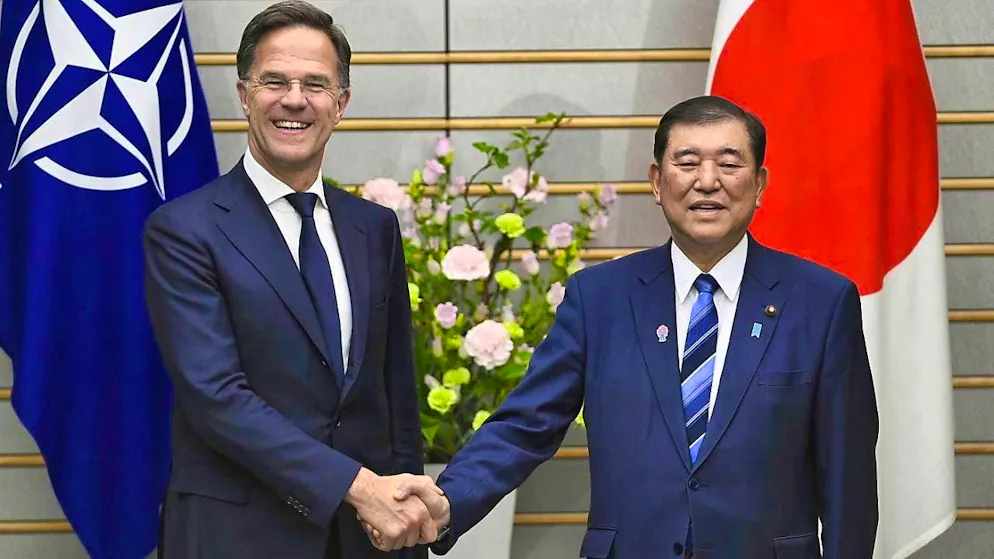 Nato Secretary General Mark Rutte (l) shakes hands with Japanese Prime Minister Shigeru Ishiba before a meeting in the Prime Minister's office. Photo: David Mareuil/Pool Anadolu Agency via AP/dpa