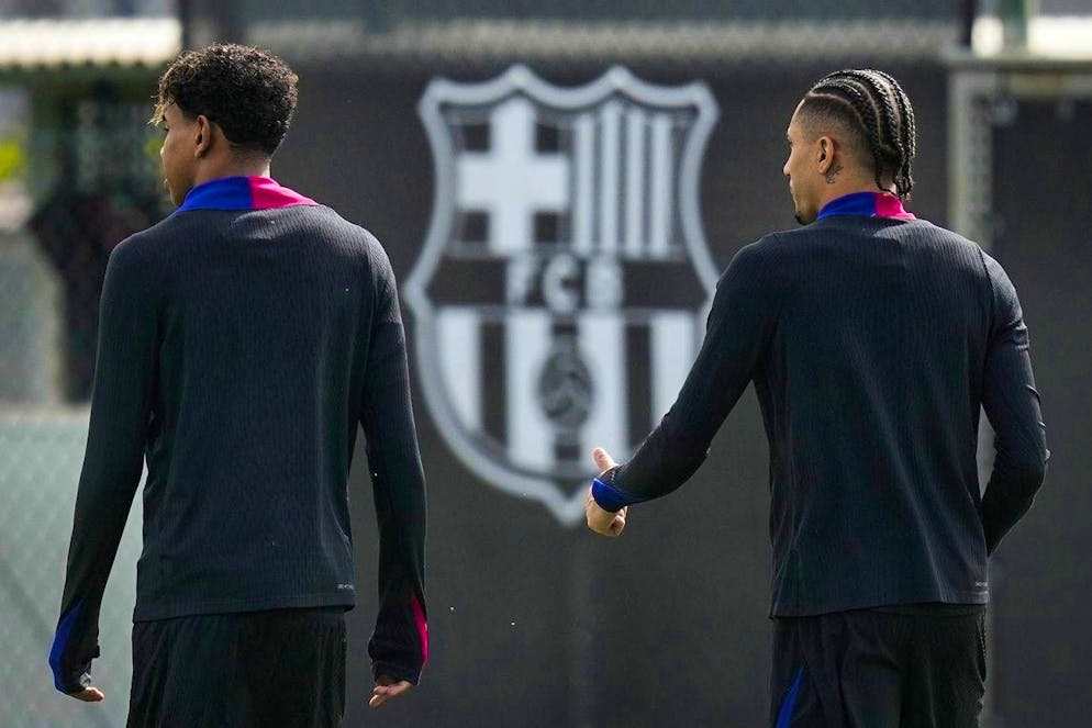 Barcelona captain Raphinha (right) could make history.