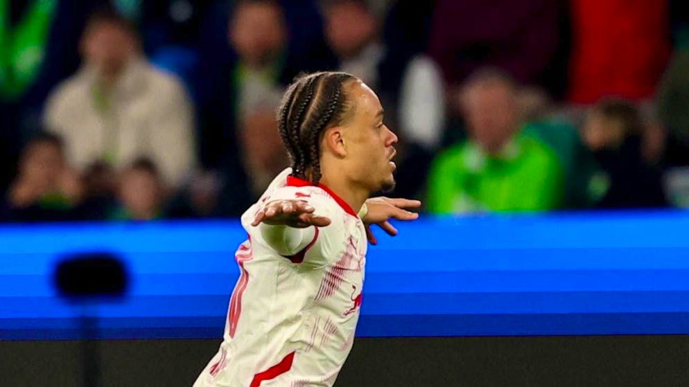 The high-flyer: Xavi Simons scores twice to lead Leipzig to an important 3:2 win in Wolfsburg