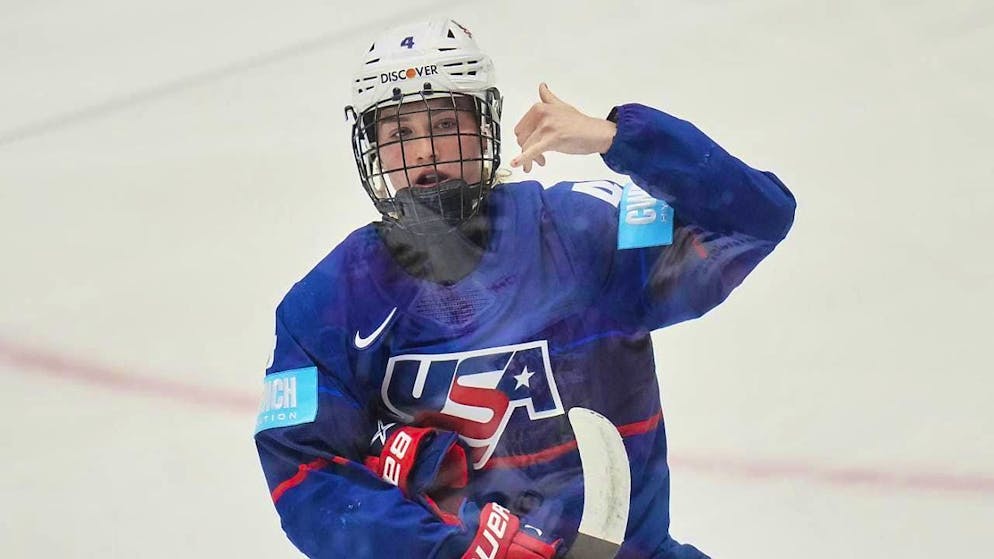 Caroline Harvey celebrates as one of the US scorers.