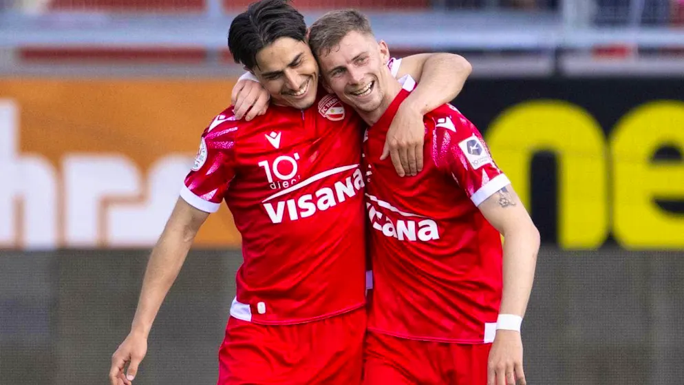 Thun's 4-0 goalscorer Nils Reichmuth (left) celebrates with Fabio Fehr.
