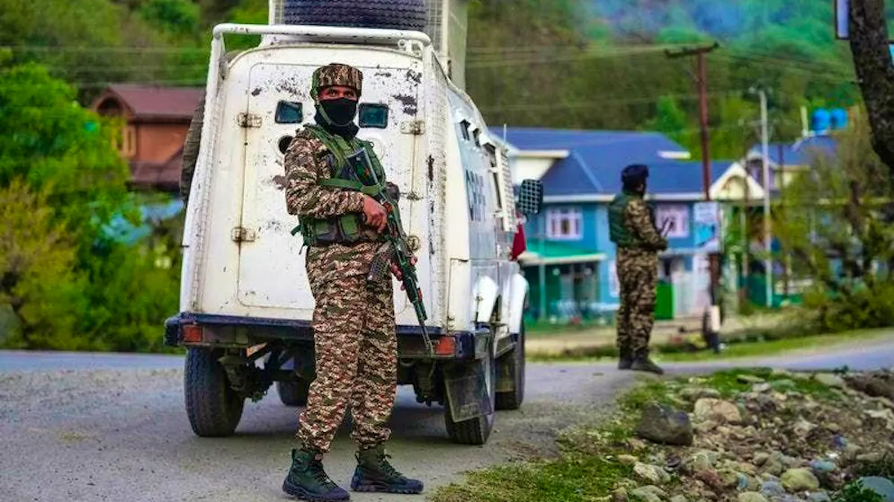 Indian security officials stand guard near Pahalgam in southern Kashmir after attackers opened indiscriminate fire on tourists in Indian-controlled Kashmir