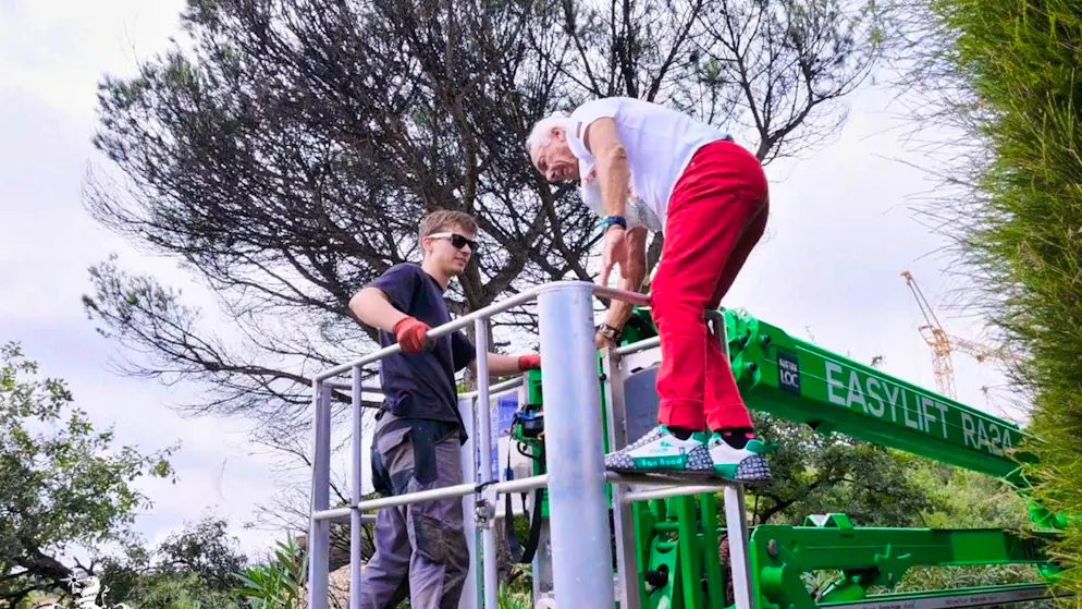 Grandpa Reinhold is determined to prune the trees on his son's property himself.