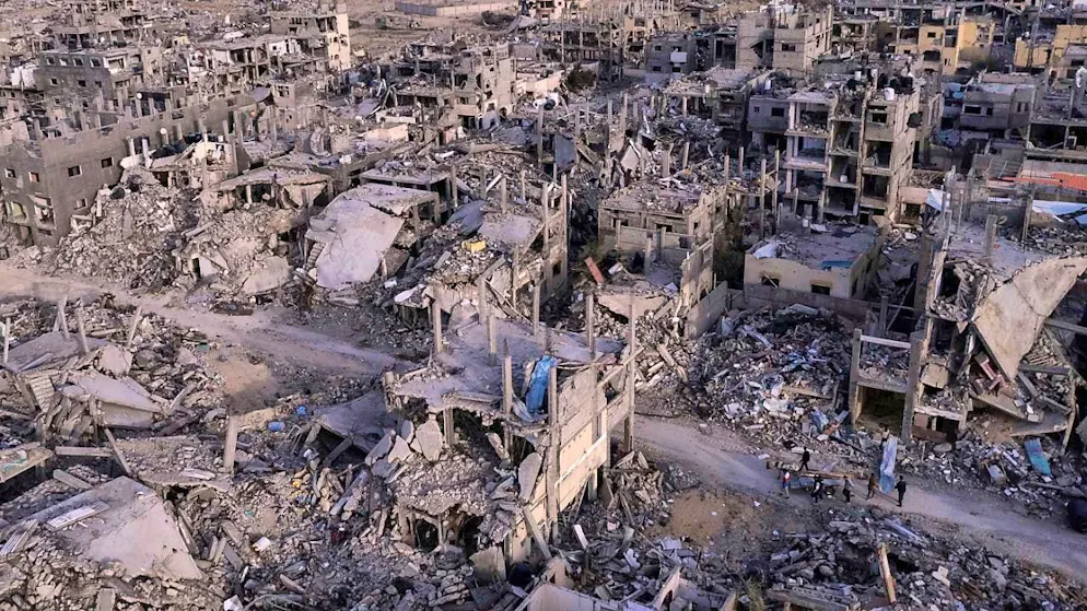 ARCHIVE - An aerial photograph taken by a drone shows Palestinians in the ruins of the town of Rafah in the south of the Gaza Strip. It was reduced to rubble by Israeli attacks. Photo: Mohammad Abu Samra/AP/dpa