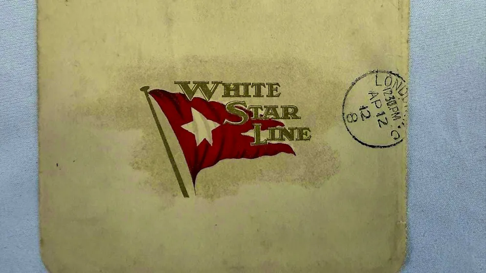 The postcard of a "Titanic" survivor, sent on the day of the ship's departure, has been auctioned off in England for a record price.