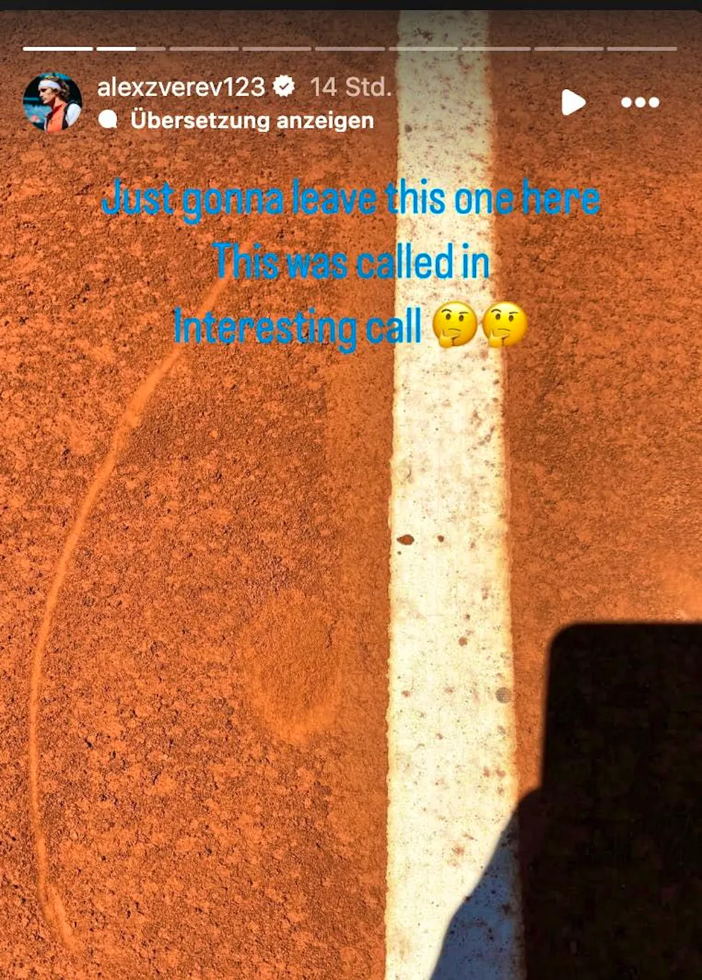 Zverev takes a photo to prove his mistake.