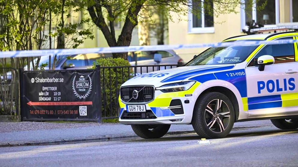 A police vehicle at the crime scene in the center of Uppsala. Photo: Fredrik Sandberg/TT News Agency/AP/dpa/Archive image
