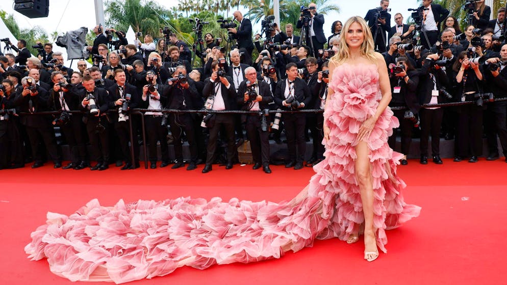 Because of too large a train. Heidi Klum breaks the new dress code in Cannes