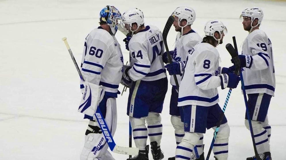 Toronto goalie Joseph Woll celebrates his first playoff shutout
