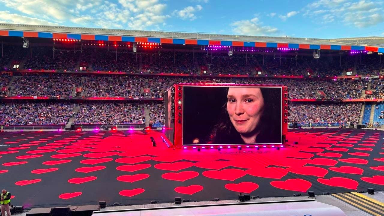 Music. Anna Rossinelli opens the pre-show at the Pubic Viewing Arena