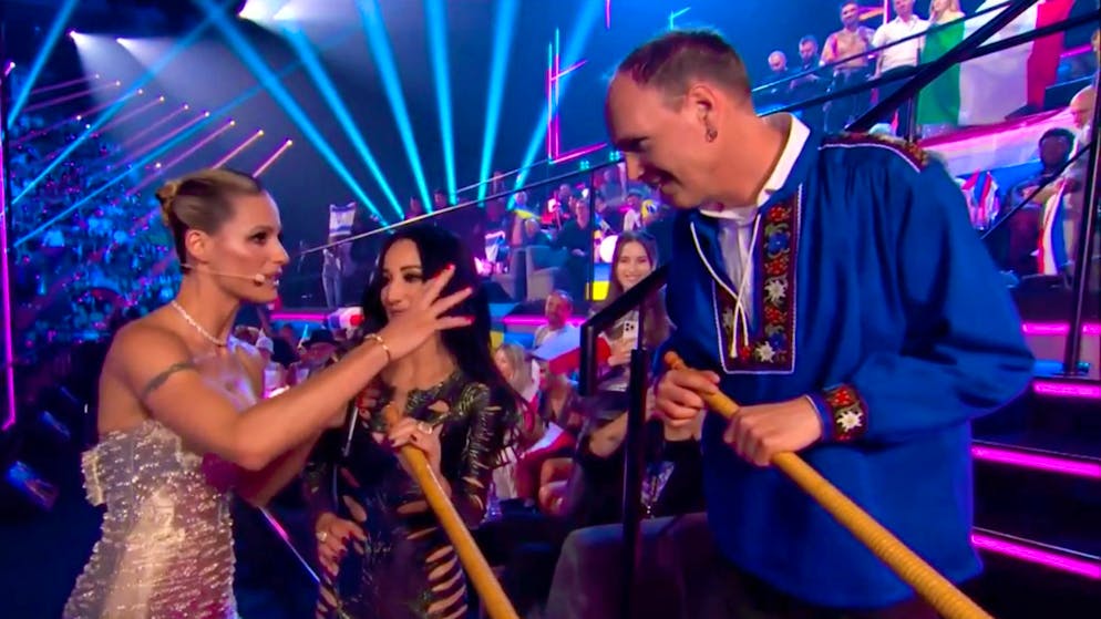 The Swiss can do flag-waving and Alphon blowing, says the BBC.