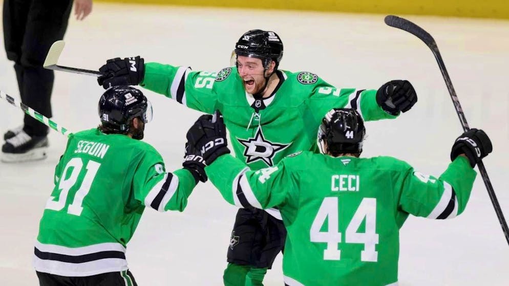 Dallas' goal scorer Thomas Harley (center) celebrates with Tyler Seguin (left) and Cody Ceci about his 2-1 overtime winner against the Winnipeg Jets