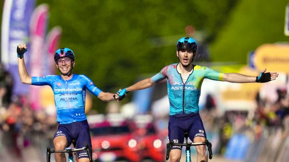 Christian Scaroni (right in green shirt) celebrates. His compatriot and teammate Lorenzo Fortunato leaves the victory to him