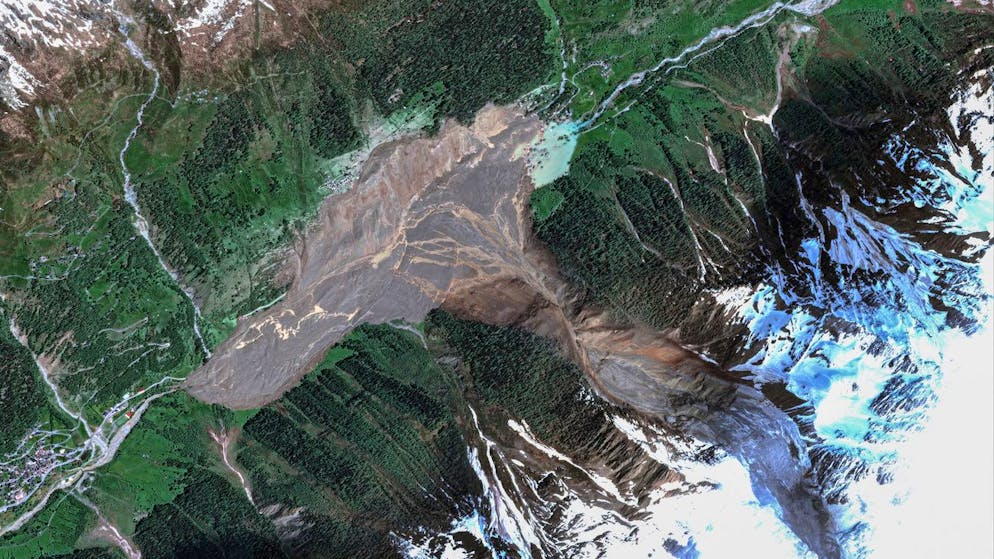 Interactive before and after comparison. Satellite images show the extent of the glacier collapse