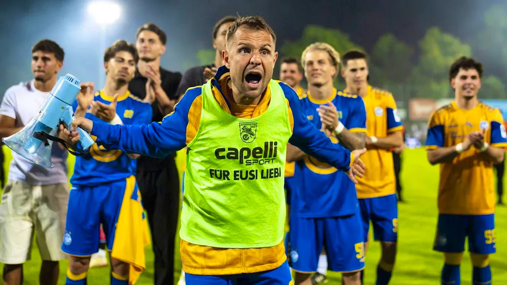 Amir Abrashi celebrates with the GC fans after securing relegation.