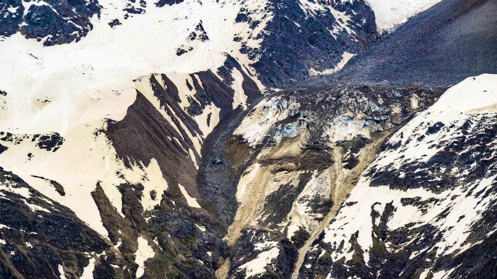 Stones from a rockslide from the Kleine Nesthorn fall onto the Birch Glacier on May 25, 2025.