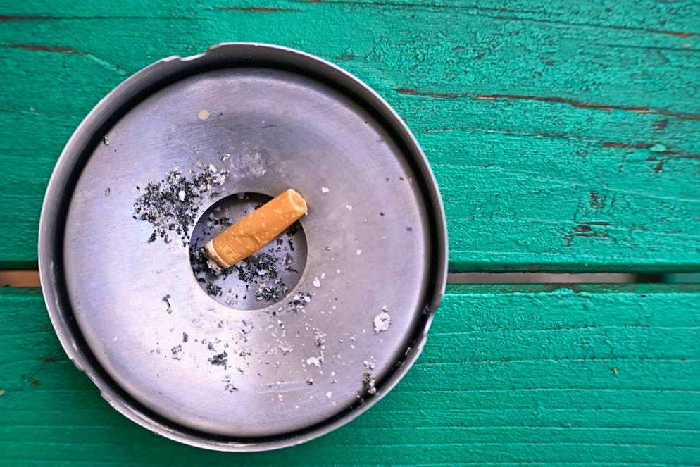 What really helps you quit smoking?. Some people smell the ashtray to help them quit (archive image).