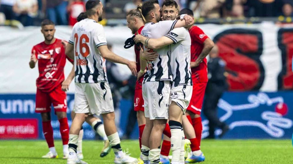 Albian Ajeti and Dominik Schmid (right) embrace each other