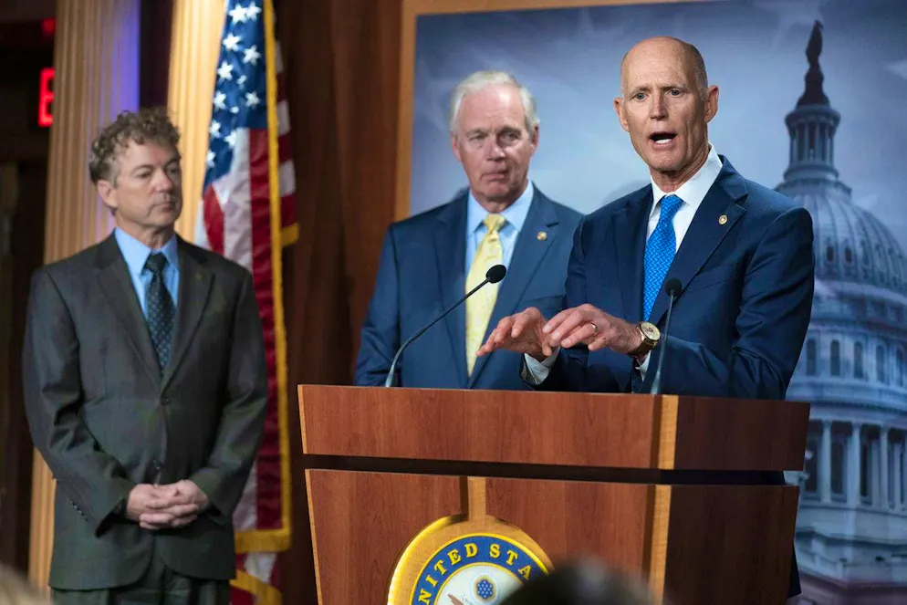 From left:. Rand Paul, Ron Johnson and Rick Scott discuss U.S. economic policy on Jan. 25 in Washington.