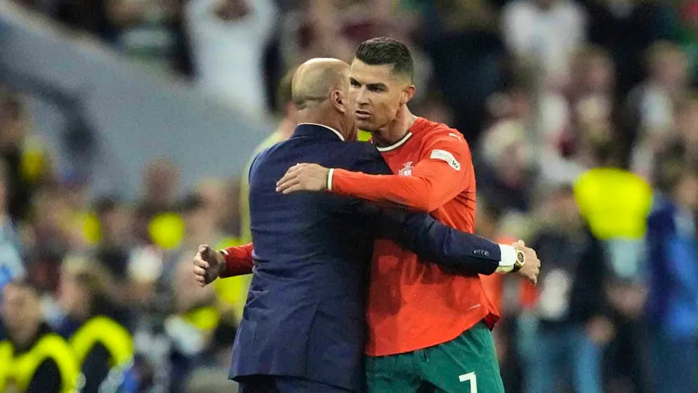 Cristiano Ronaldo gets the thanks of national coach Roberto Martinez