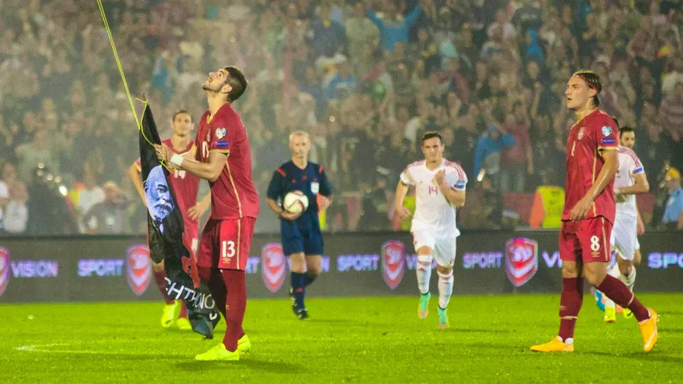 Serbia vs. Albania October 14, 2014. Stefan Mitrovic pulled the flag down.