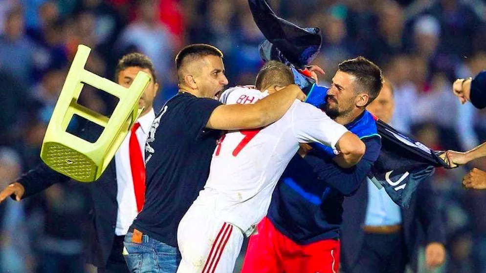 Serbia vs. Albania October 14, 2014. The match between Serbia and Albania on October 14, 2014 escalated. A Serbian supporter attacked the Albanian players.